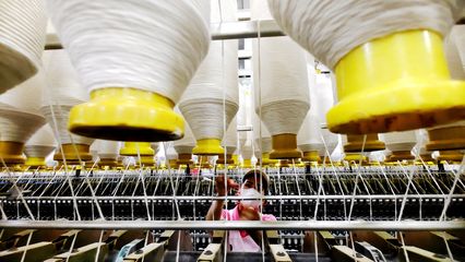 紡織企業開足馬力促生產，針紡織品市場活力涌動